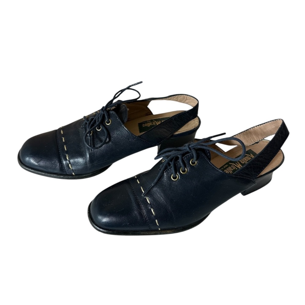 Vintage 1950’s slingback heels by Amalia Miralles blue leather lace up yellow